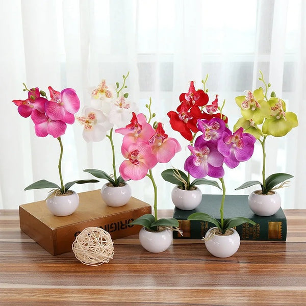 Artificial orchids flowers in a ceramic pot – realistic home decoration for living room, bedroom, or office.