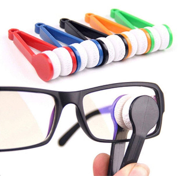 A collection of microfiber eyeglass lens cleaners in various solid colors, designed to be portable and used with eyewear.